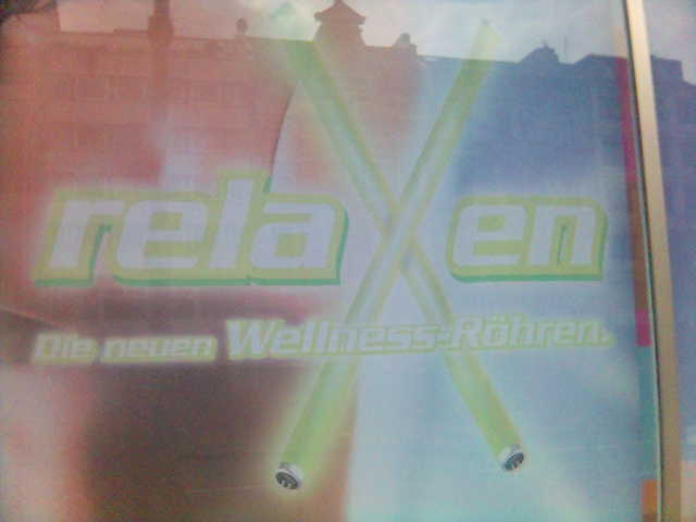 Wellness-Rhren neu relax roehre plakat schaufenster sonnenstudio werbung wellness 