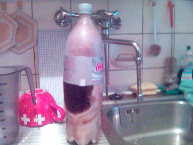 Eisgekhlte Coca-Cola gefroren cola eis tasse kalt flasche kueche 